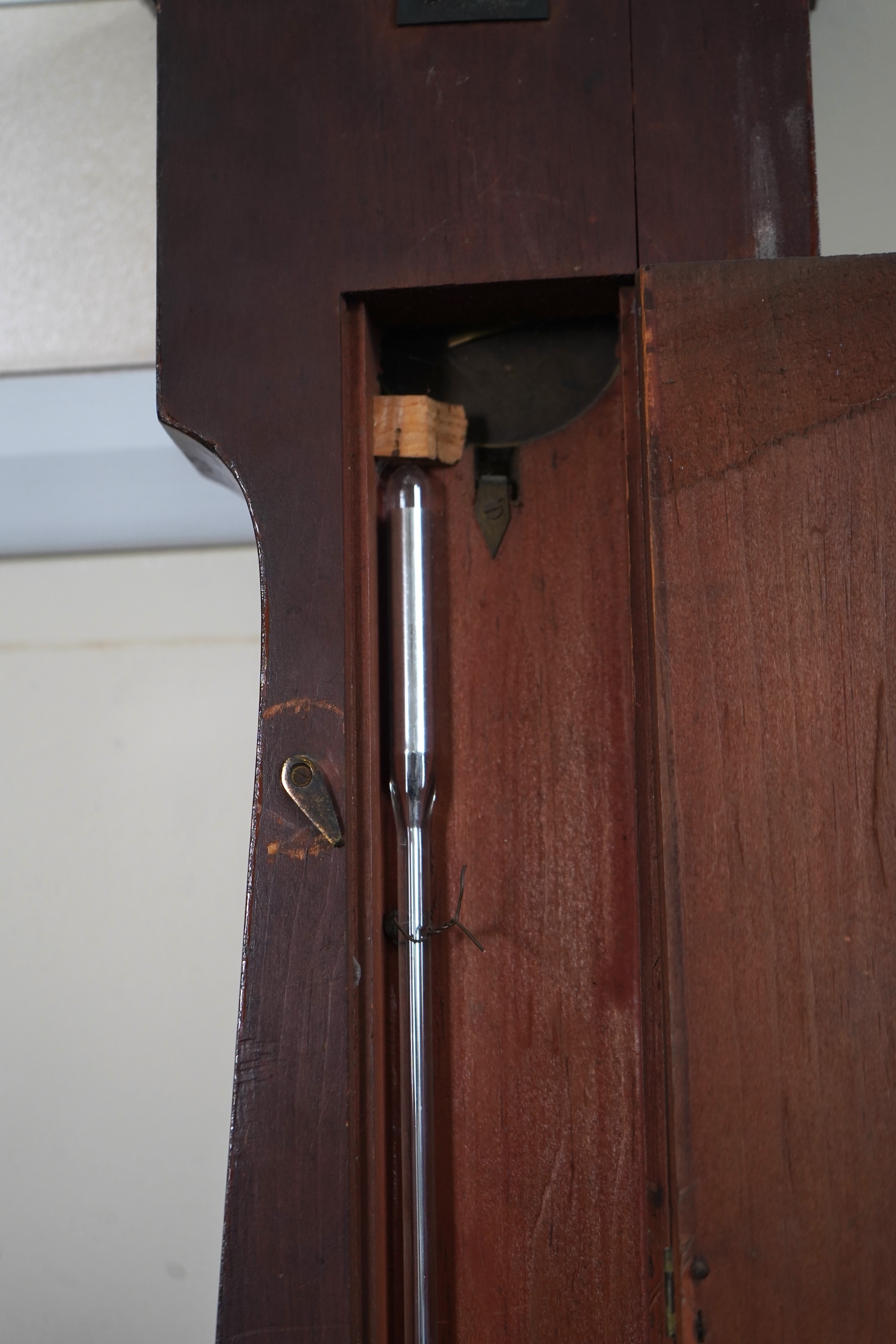 A large mid 19th century tulipwood banded mahogany wheel barometer, by C. Rimondi, Halifax